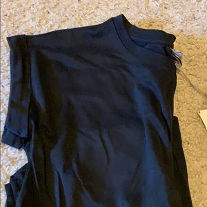 Black M T-shirt. NWT. Has pocket on left side.